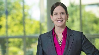 A headshot of Laura DeNardis, Ph.D., a globally-recognized technology and society scholar