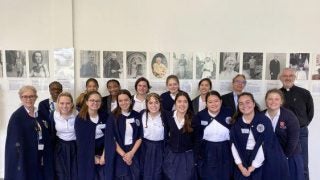 A group of nursing students pose together while on an immersion trip to Lourdes, France in June.