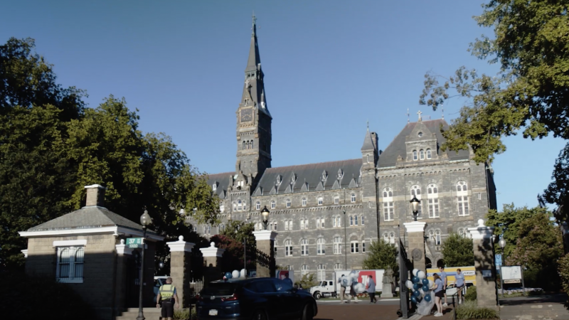 An image of the front of Healy Hall on a bright blue sunny day.