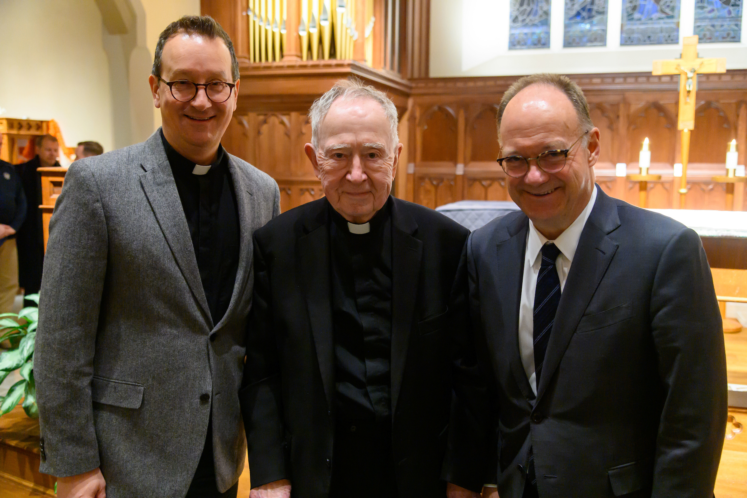 Vice President for Mission & Ministry Rev. Mark Bosco, S.J. (left), O’Malley (center) and President DeGioia (right) 