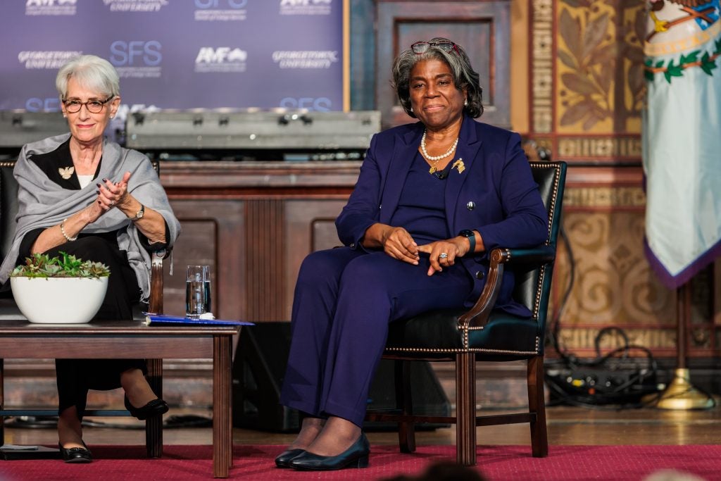 Wendy Sherman and Linda Thomas-Greenfield sit on stage.