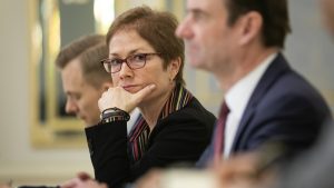 Marie Yovanovitch, looking at former Ukrainian President Petro Poroshenko, seated to her left.