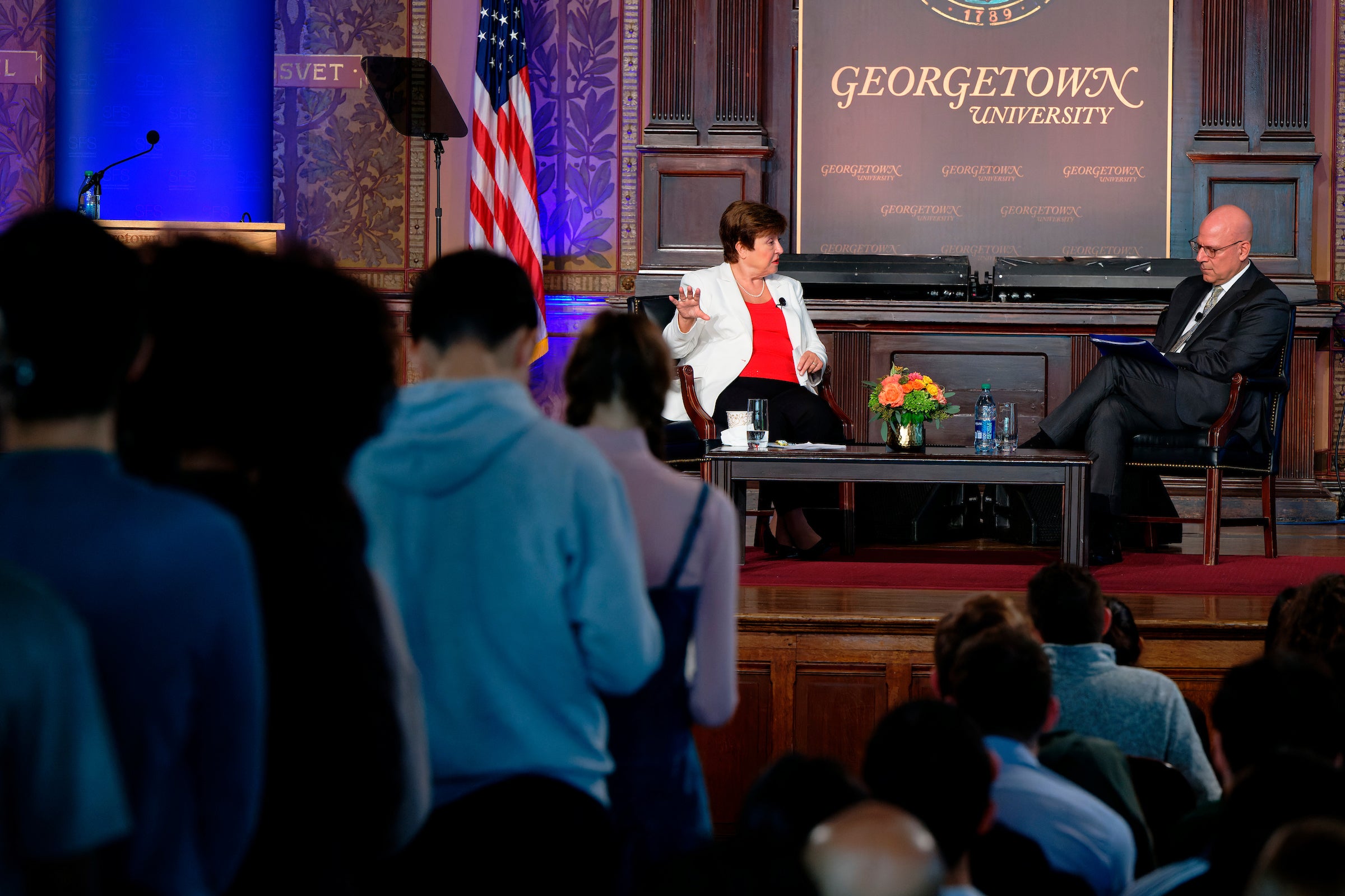 Students wait in line to ask Kristalina Georgieva a question from the audience.