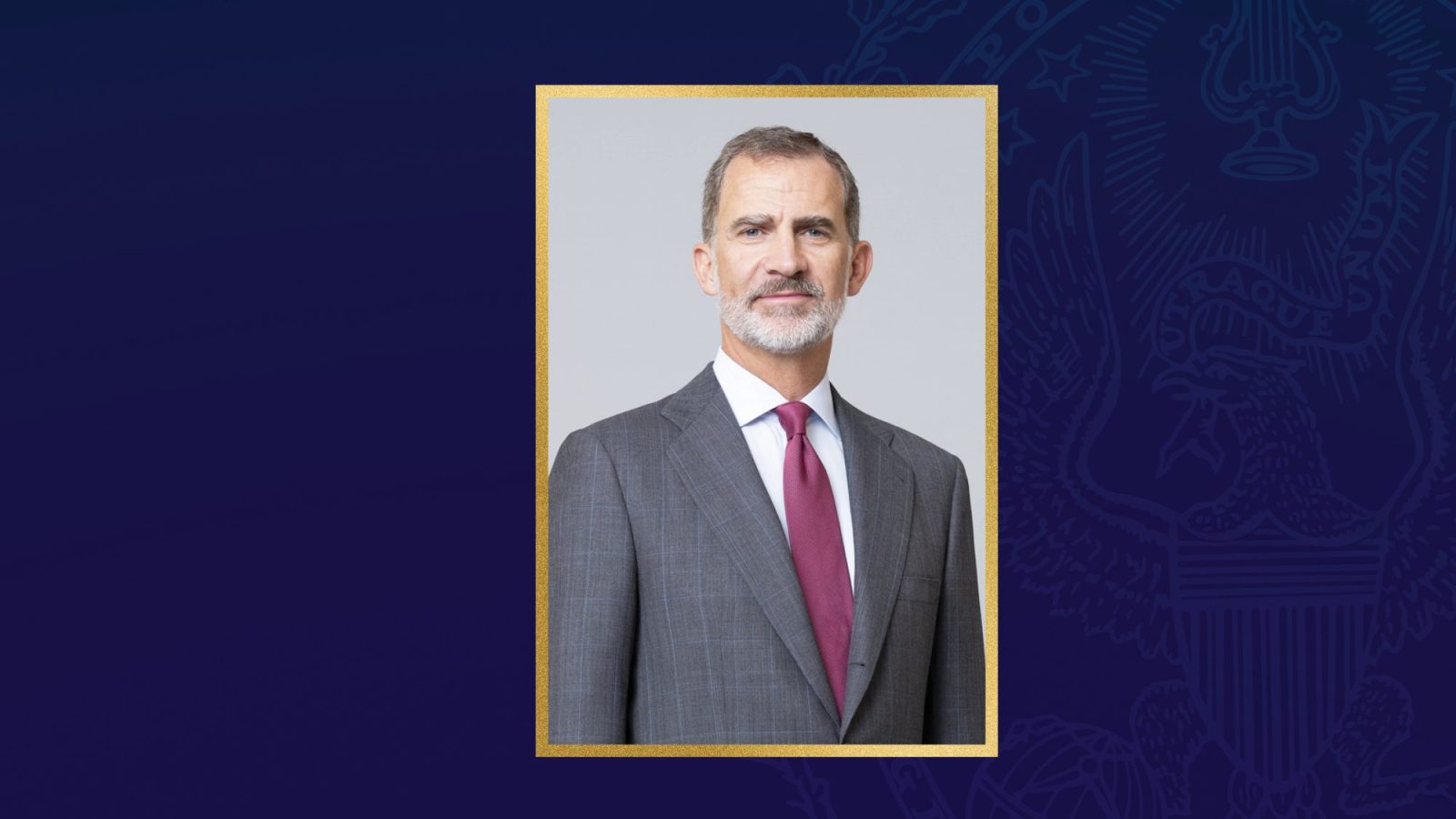 A headshot of King Felipe of Spain, who is wearing a gray suit and a burgundy tie, with a dark blue background behind his headshot.