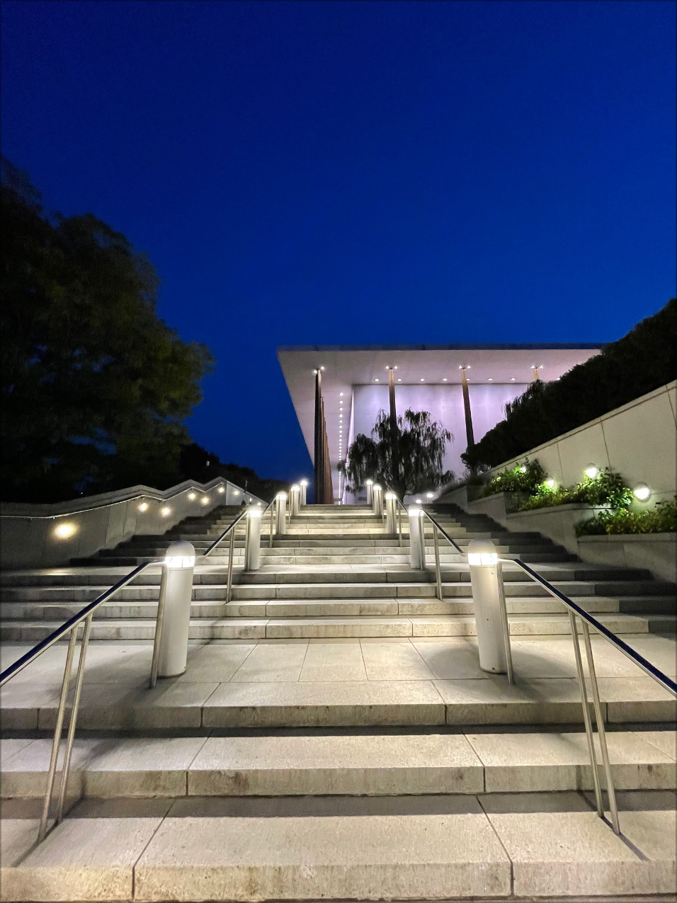 Lights under railings going up the stairs to the Kennedy Center