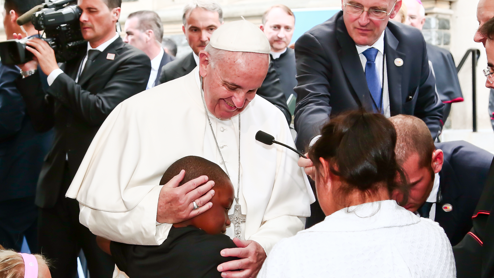 Pope Francis with young boy at Catholic Charities Luncheon in Washington, DC, on September 24, 2015