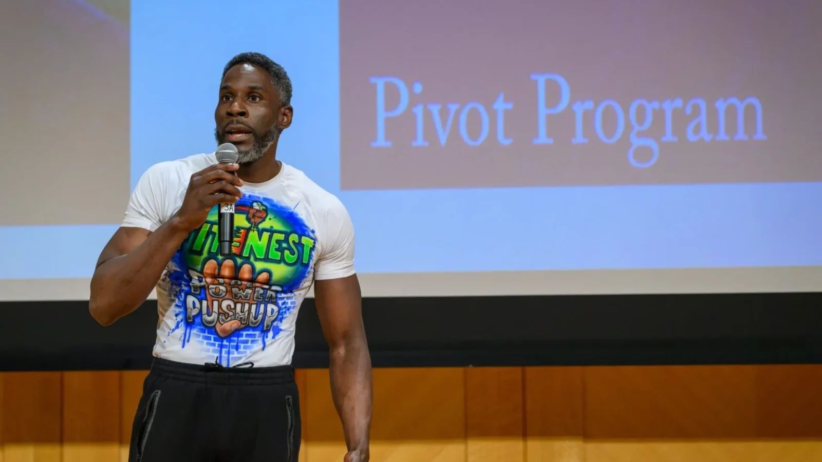 Pivot&#039;s Raashed Hall presents at the MSB Rocket Pitch competition on Feb. 2 in front of a screen that reads &quot;Pivot Program.&quot;