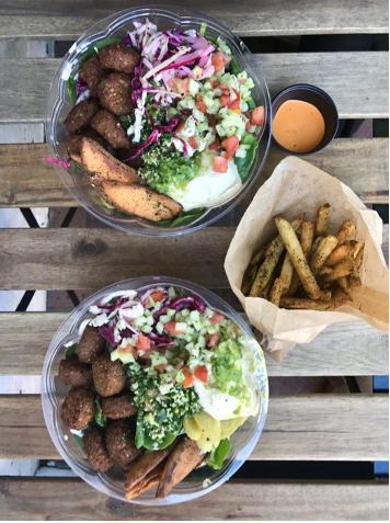 two falafel bowls with fries
