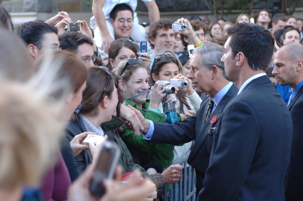 King Charles meets with students in Healy Circle.