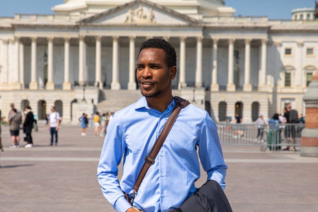 Gandawa walks in front of the U.S. Capitol.