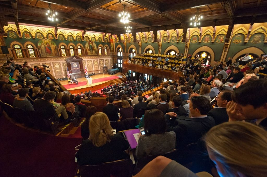 A view of the stage from the second floor of crowded Gaston Hall.