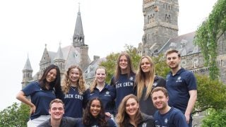 Jack the Bulldog and his crew pose for a photo on Healy Lawn