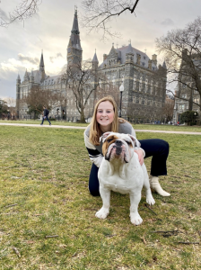 Regan Fisher (H'23) poses with Jack on Healy Lawn