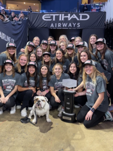 The Georgetown women's soccer team celebrate being the 2022 Big East Champions with Jack the Bulldog at Capitol One Arena in Washington, DC.