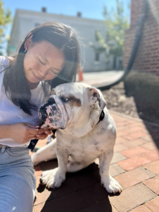 Shirley Hu (SFS'22) leans into Jack the Bulldog