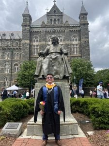 Sulague at graduation on Healy Lawn.