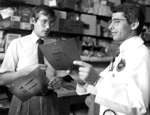 Drs. Anthony Fauci and Clifford Lane (deputy director for clinical research and special projects) discuss AIDS-related data in 1987. 