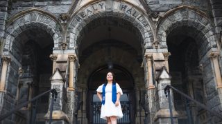 Sofia Chen Ma (B&#039;23) stands on the Healy steps outside Healy Hall in the weeks before her graduation from Georgetown.