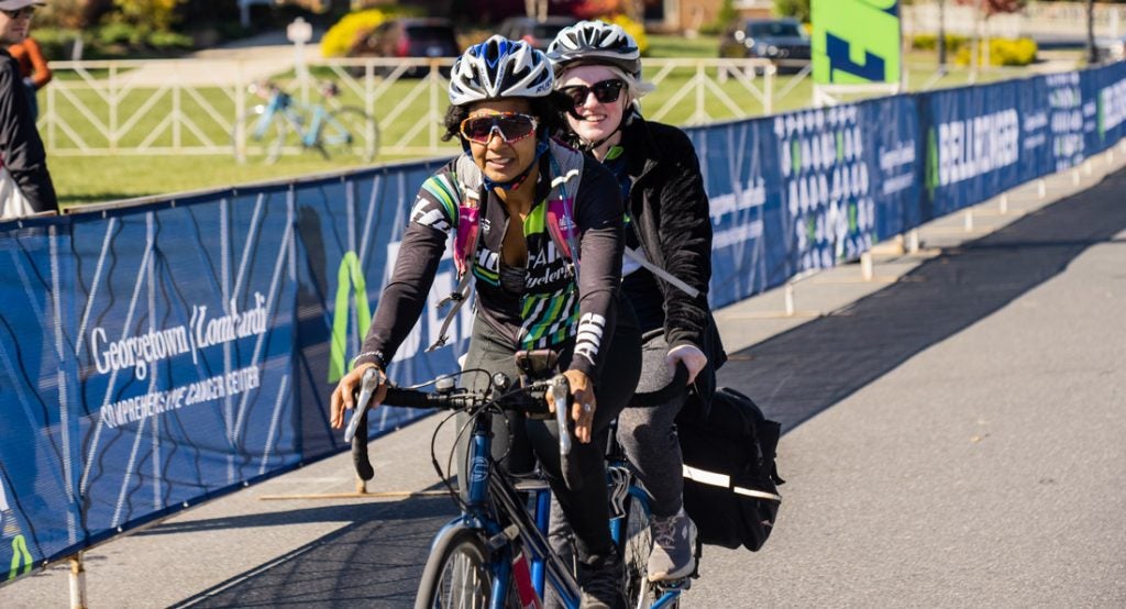 Marissa Nissley (B’24) rides tandem with another rider on a 50-mile bike race. 