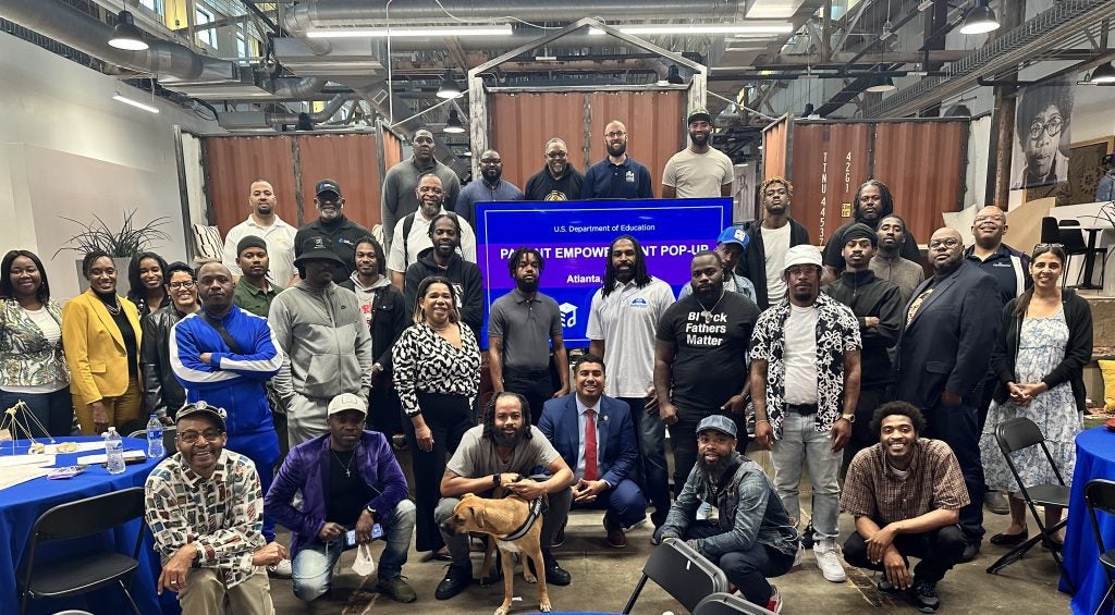 Gonzalez (center) at a Parent Empowerment Pop-Up he hosted in Atlanta, Georgia, in 2023. 