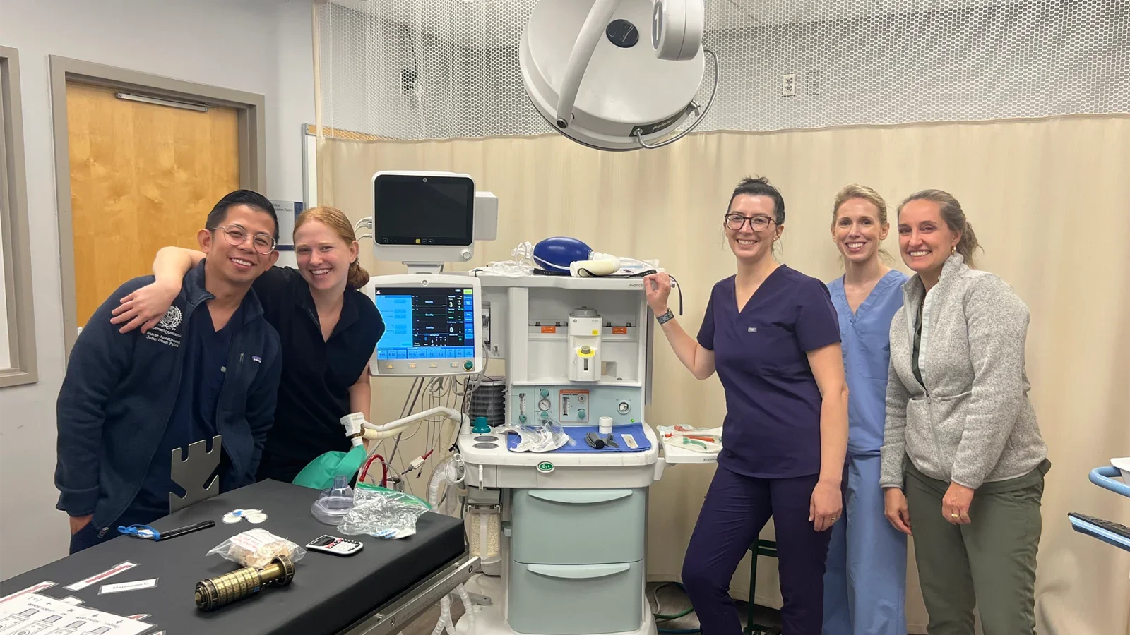 Nursing students pose in a medical-themed Escape Room.