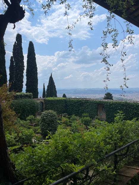 Green gardens look over the Italian skyline