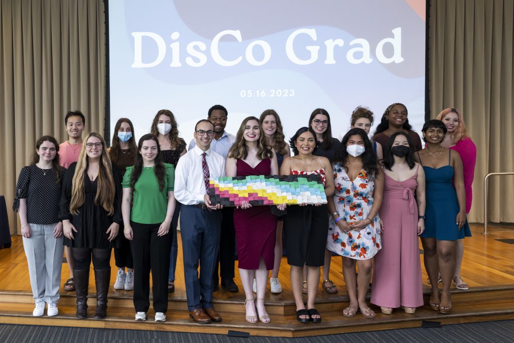 A group of Georgetown students who graduated in 2023 celebrate DisCo Grad, which honored graduating students in the disability community.