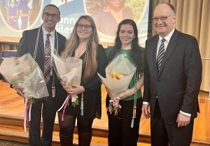 A group of Georgetown students with President John J. DeGioia at the inaugural DisCo Graduation, which celebrated the disability community and the graduating Class of 2023.