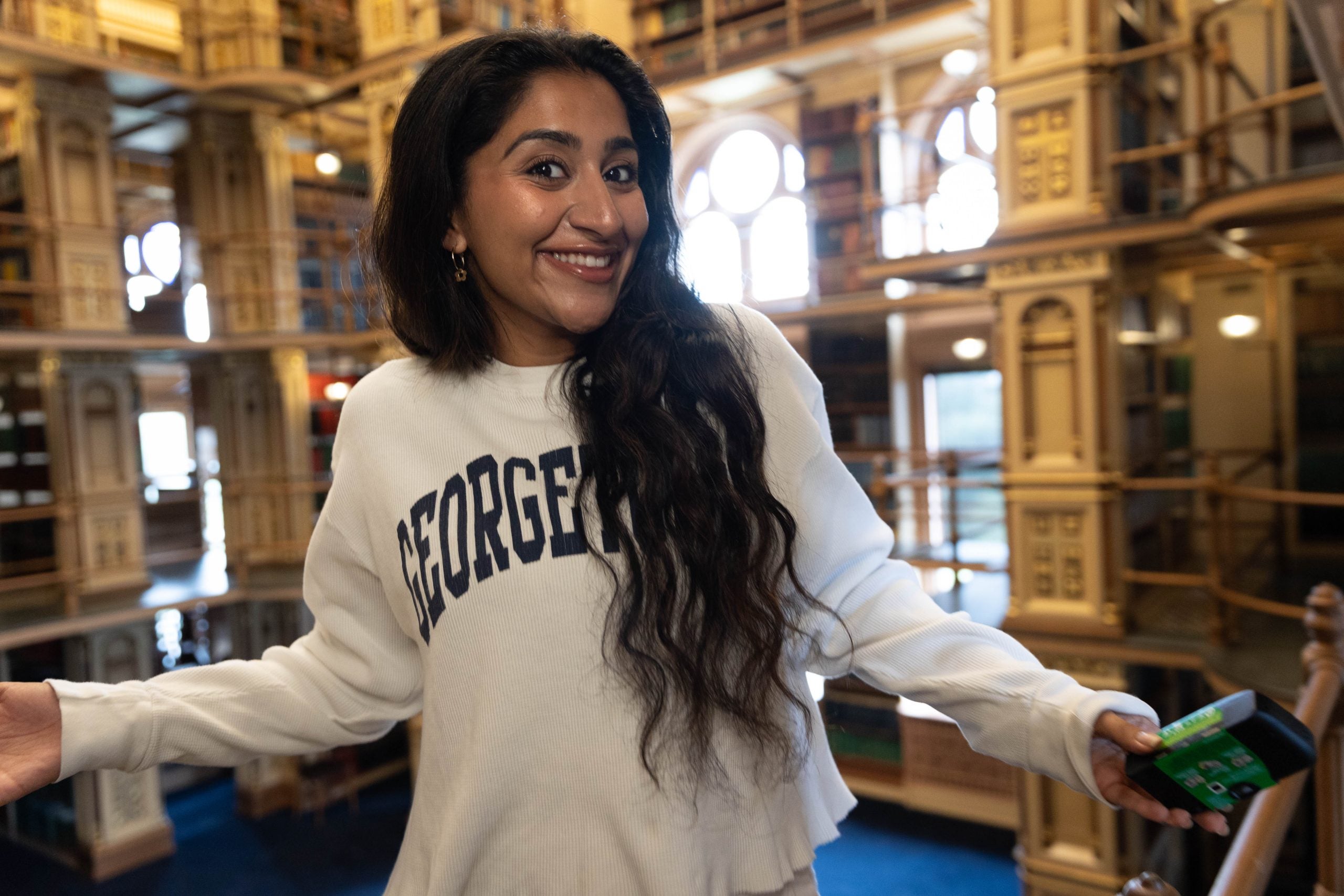 Harnoor Sachar in a GU sweatshirt