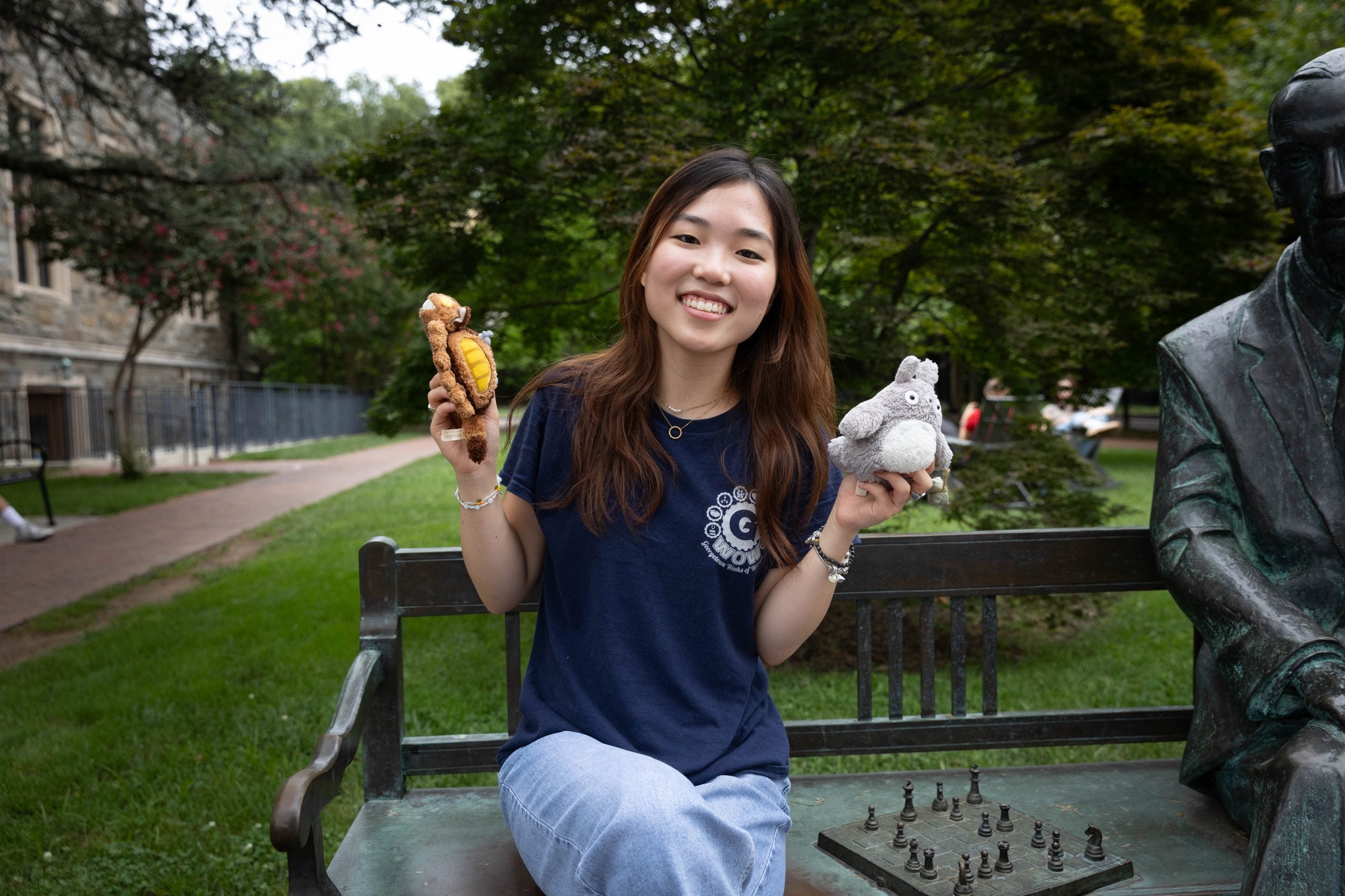 Ashley Jeong sitting on a bench 