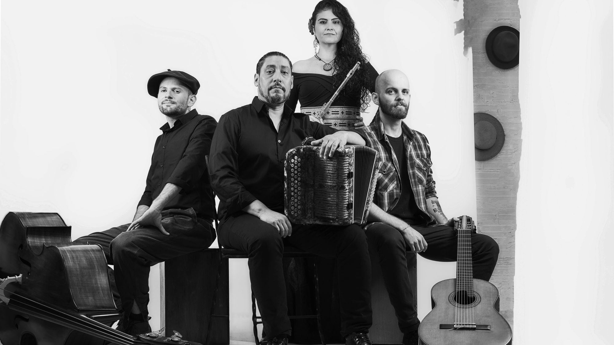 Brittes ensemble, posing with instruments.