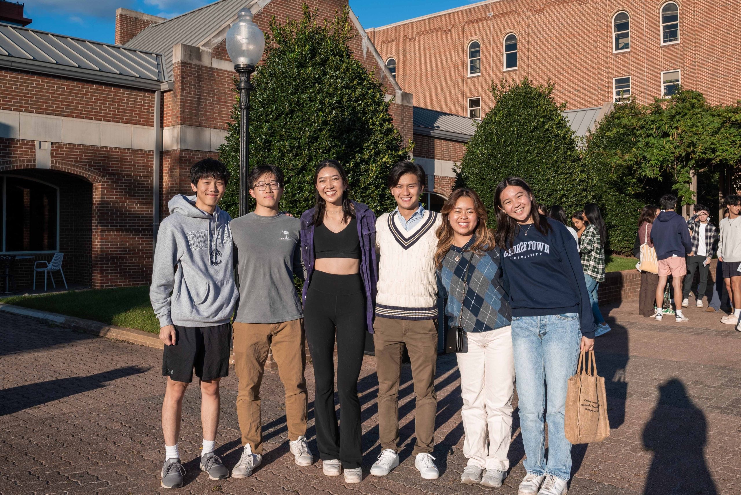 Bennie poses with his AASA family members