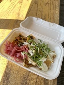 rice bowl with fried tofu, cucumber kimchi and pickled onions