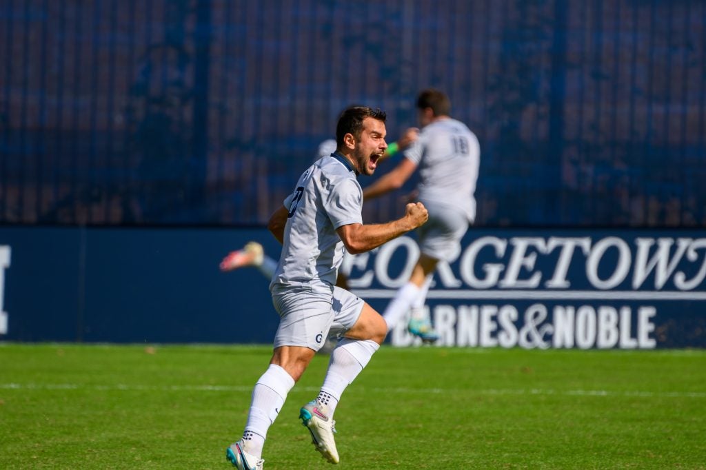 Men's soccer player celebrating