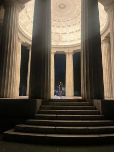 Mara stands in memorial at the center of the DC War Memorial