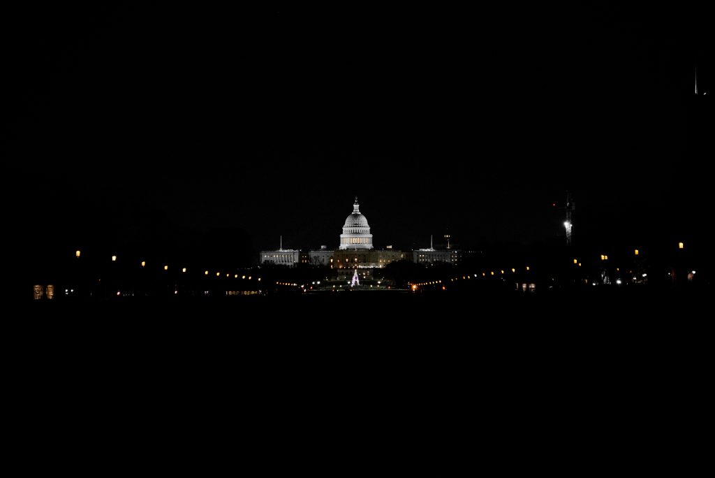 The Capitol building lit up at night