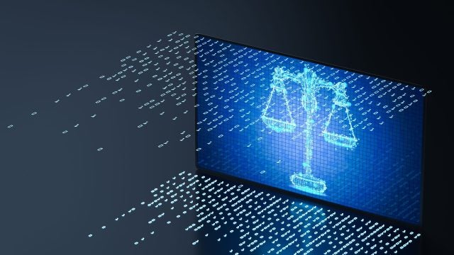 A 3D rendering of a digital screen display with a scale to illustrate a cyber law concept.