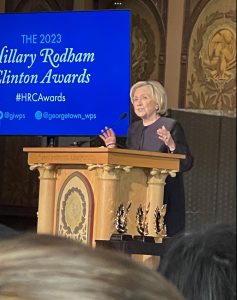 Hillary Clinton on a podium in Gaston Hall