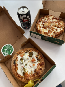 Two papa john's pizzas and a drink