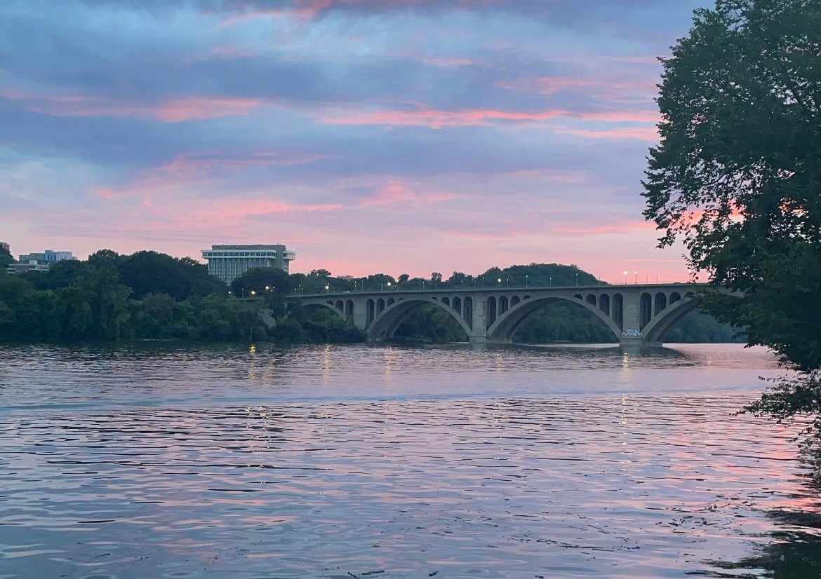 View of Potomac River and Key Bridge during a pink and purple sunset
