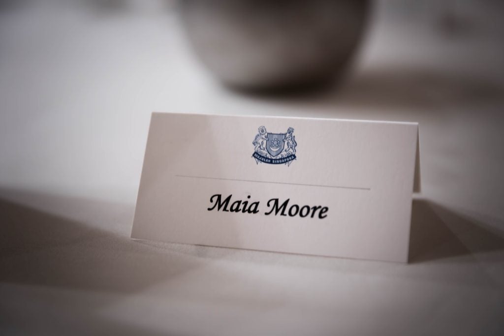A name placard with Maia Moore's name