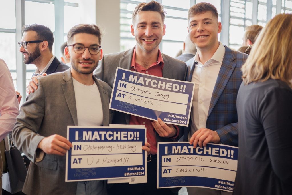 Three young men on match day