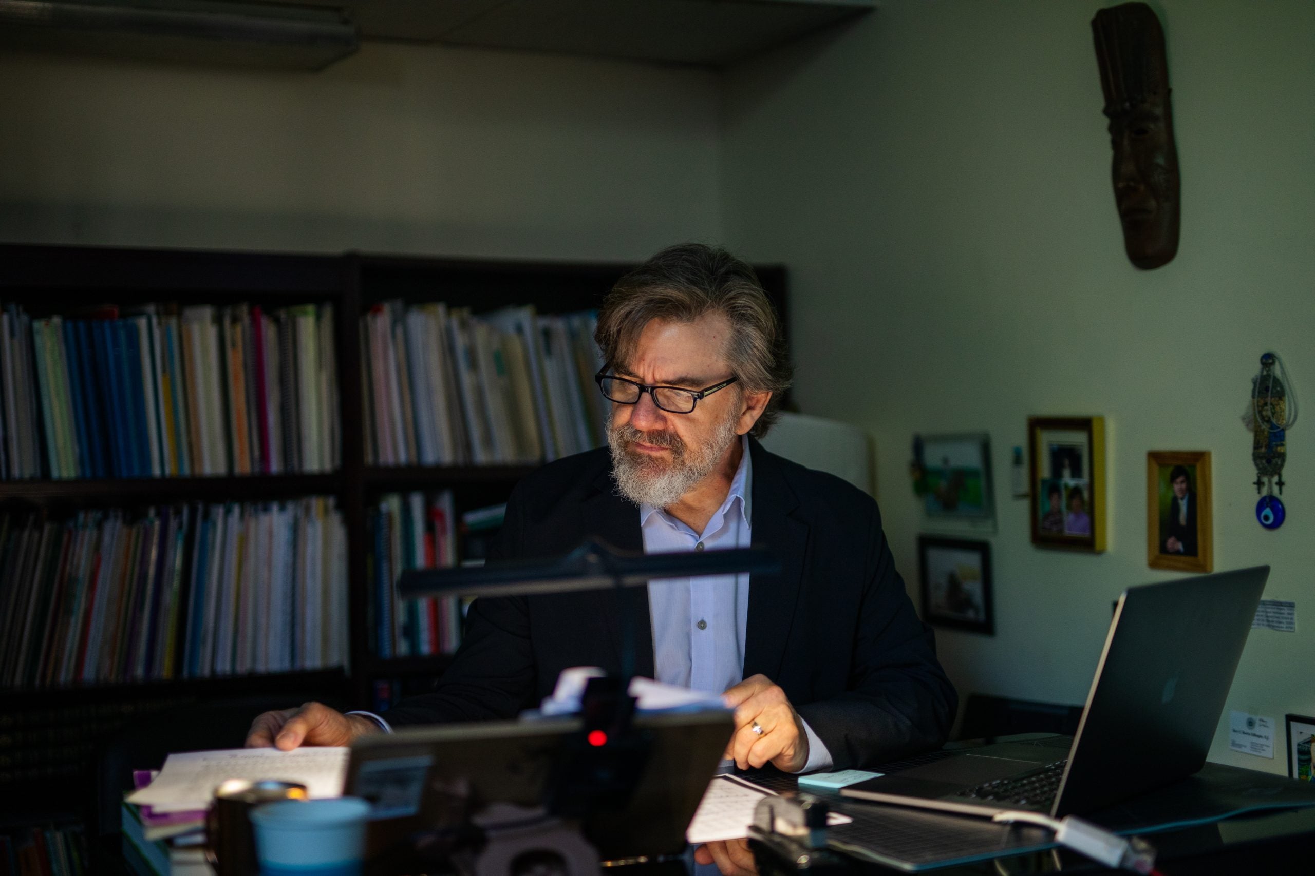 Binkholder working at his desk in his office