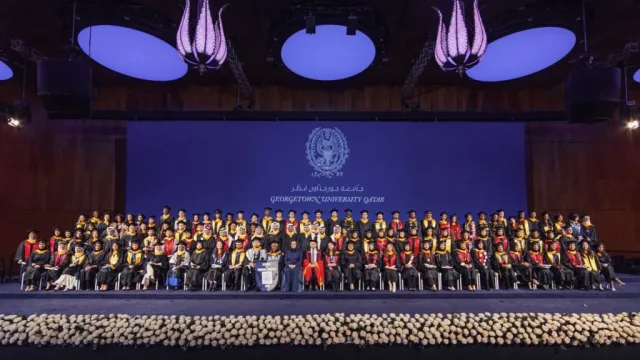 A group shot of the graduates from Georgetown University in Qatar&#039;s Class of 2024