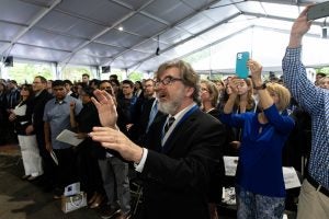 Binkholder conducting during the 2024 commencement.