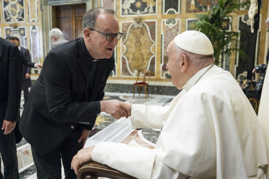 Fr. Mark Bosco, vice president for Mission & Ministry at Georgetown, greets Pope Francis in the Vatican