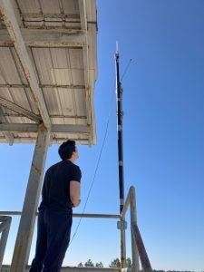 Eli working with a product and an antenna