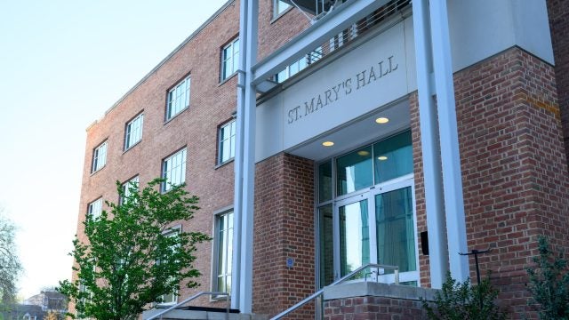 A brick building that says &quot;St. Mary&#039;s Hall&quot; on the front entrance