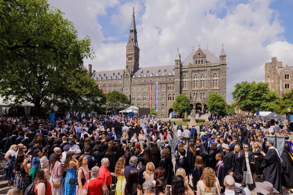 An aerial photograph of Healy Circle during commencement filled with graduates and guests.