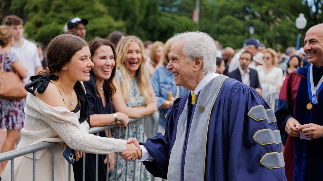 Henry Winkler greets a crowd as he walks into Georgetown&#039;s graduation